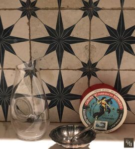 tile as a backsplash in Pamela O'Brien's pantry decorative tile in Pamela O'Brien's pantry