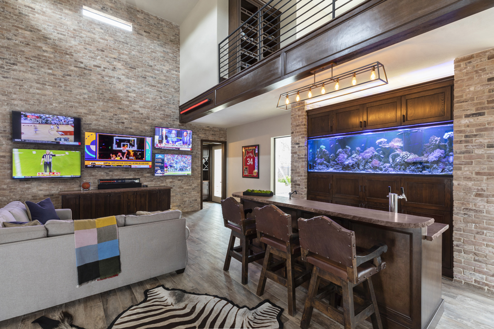 in home bar and study with nearby home office redefines multifunctional spaces Home office meets man cave extraordinaire